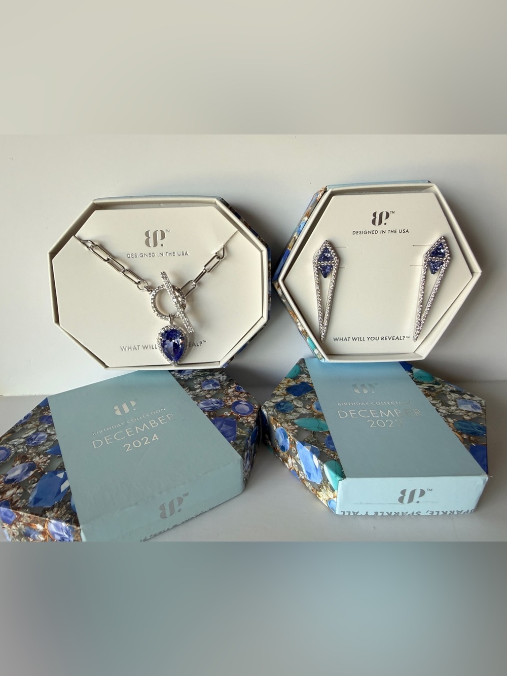 Bomb Party Rhodium Necklace & Earring Set with Blue Teardrop Stones. NIB